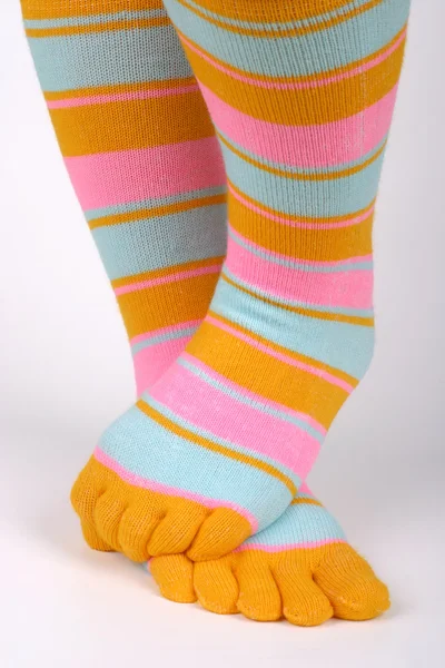 Legs with colorful socks — Stock Photo, Image