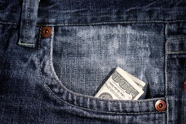 100 dollar bill in pocket — Stock Photo, Image