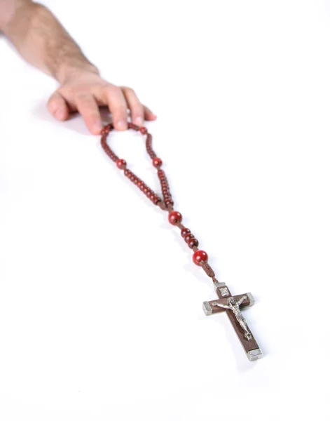 The Christian beads and human hand — Stock Photo, Image