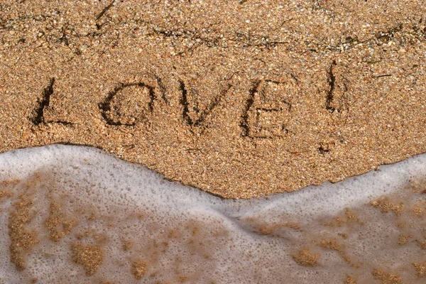 Liefde inscripties op het strand — Stockfoto