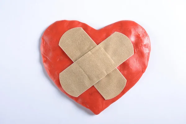 Corazón vith cinta médica — Foto de Stock