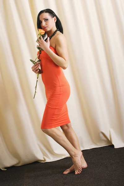 Young girl with red rose — Stock Photo, Image