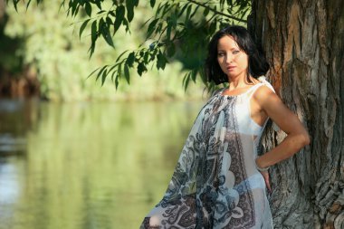 Nice woman near river