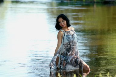 Nice woman near river