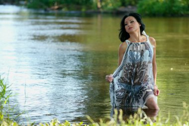 Nice woman near river