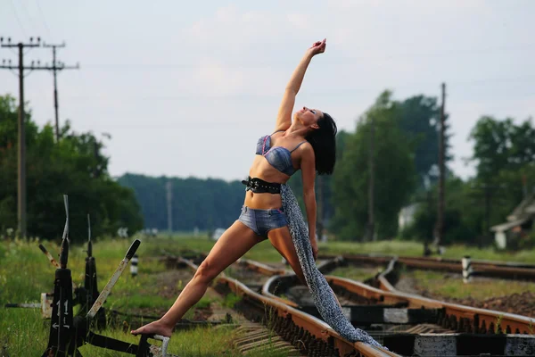 Young girl on the railroad track — Stock Photo, Image