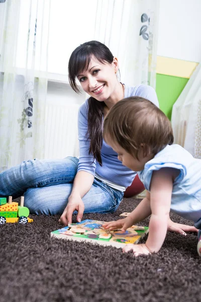Woman with a toddler — Stock Photo, Image