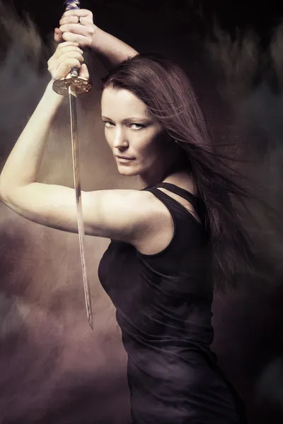 Woman with sword — Stock Photo, Image