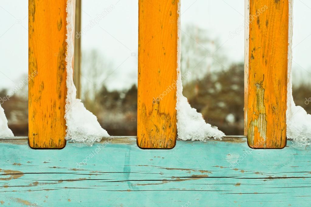 Snow on railings