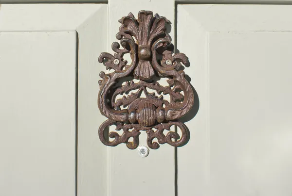 Antique door knocker — Stock Photo, Image