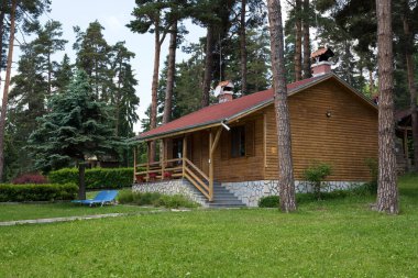 Cozy bungalow in a picturesque mountain campsite in Bulgaria, Eastern Europe in the Rhodope Mountains