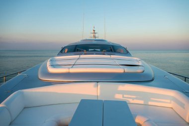Beautiful sea view from aboard of a luxury yacht at sunset / sunrise - horizontal orientation
