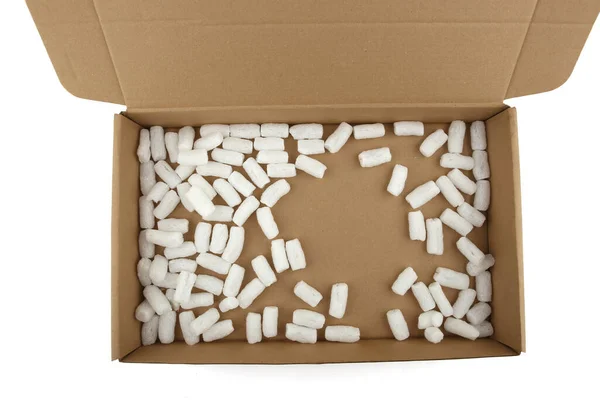 Styrofoam Packing Peanuts Cardboard Box Isolated White Background White Plastic — Foto Stock