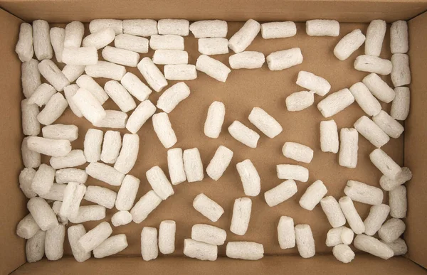 Styrofoam Embalagem Amendoins Fundo Caixa Papelão Pelotas Espuma Plástico Branco — Fotografia de Stock