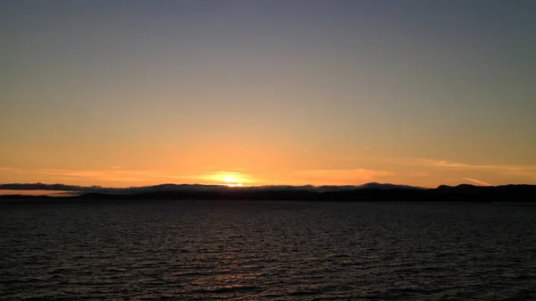カナダのバンクーバーの海での日没 ストックフォト