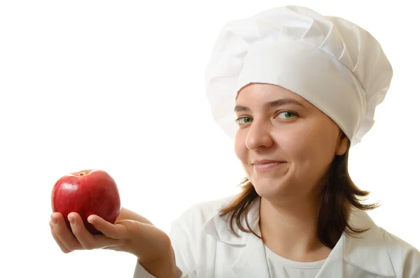 Usměvavý kuchař s jablkem — Stock fotografie