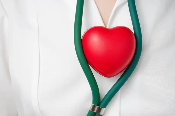 Doctor with red heart — Stock Photo, Image