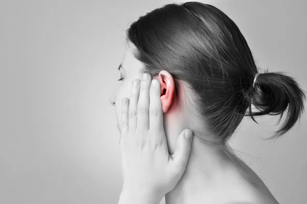 Douleur aux oreilles Photo De Stock