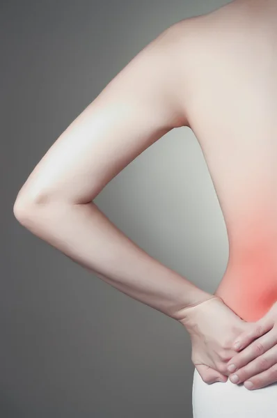 Woman with lower back pain — Stock Photo, Image