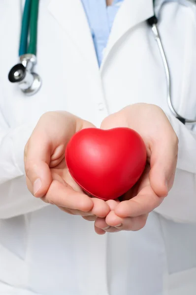 Doctor protecting a heart — Stock Photo, Image