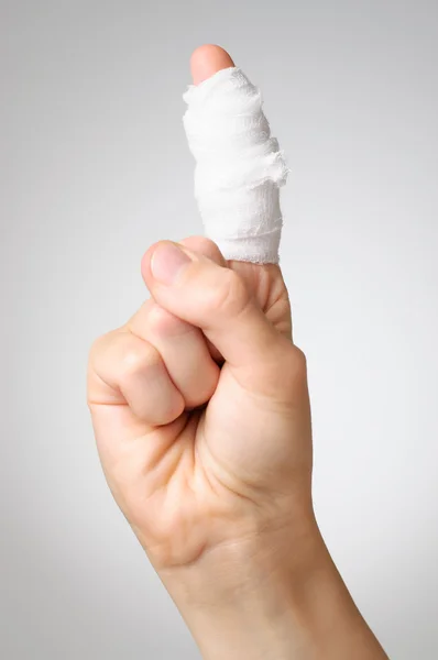 Injured finger with bandage — Stock Photo, Image