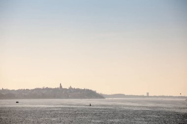 Panorama of Zemun with its gardos tower and seen from the center of  belgrade and the Danube river, or Dunav on a warm summer sunset. Belgrade is the capital city of Serbia, and Zemun one of its suburbs