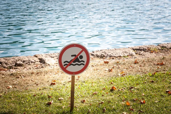 Selective Blur Standard Swimming Sign Lawn Front Water Lake Indicating Stock Photo