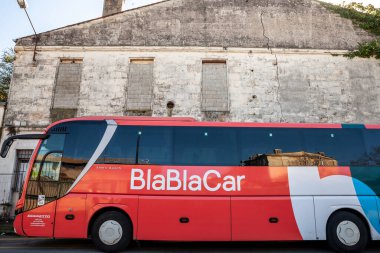 BORDEAUX, FRANCE - FEBRUARY 25, 2022: Blablacar logo on a bus of the company in Bordeaux. Blablacar bus, formerly blablabus, is a bus company belonging to the carpooling website blablacar