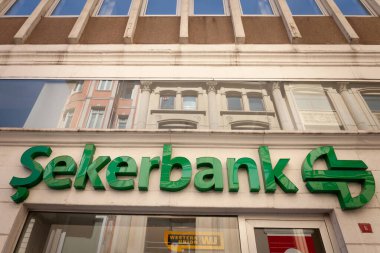 ISTANBUL, TURKEY - MAY 20, 2022: Selective blur on a Sekerbank logo on an office in Istanbul. Shekerbank is a Turkish retail banking group spread in Europe and Asia