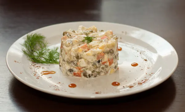 Olivier salad with mayonnaise — Stock Photo, Image