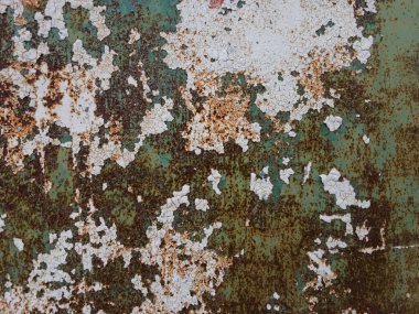 Eski bir demir paslı yüzey dokusu ve soyulmuş boya.