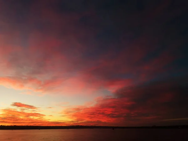 Sunrise Lake Reeds Foreground Red Orange Clouds Stock Photo