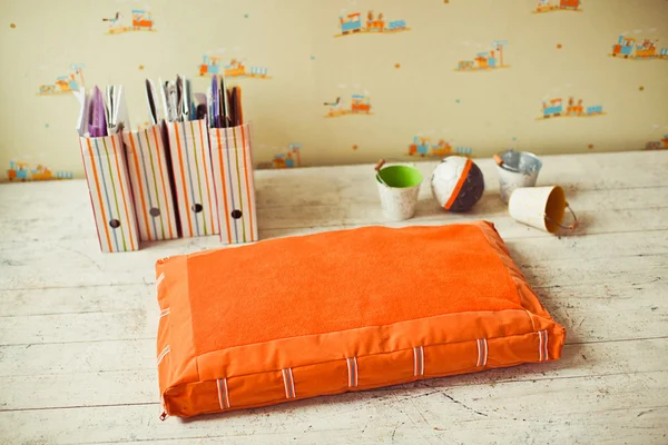 Pet mattress with pails and boxes on the floor — Stock Photo, Image