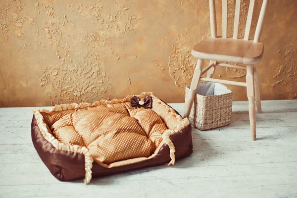 Pet mattress in interior with chair — Stock Photo, Image