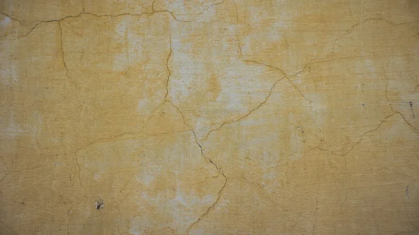 Sarı kırık duvar arka plan — Stok fotoğraf