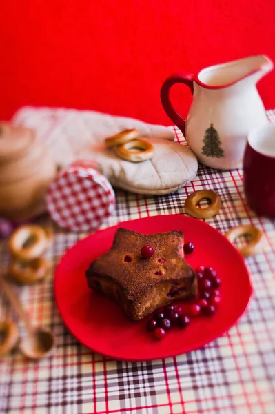 Cranberry cake on the plate in kitchen — Stock Photo, Image