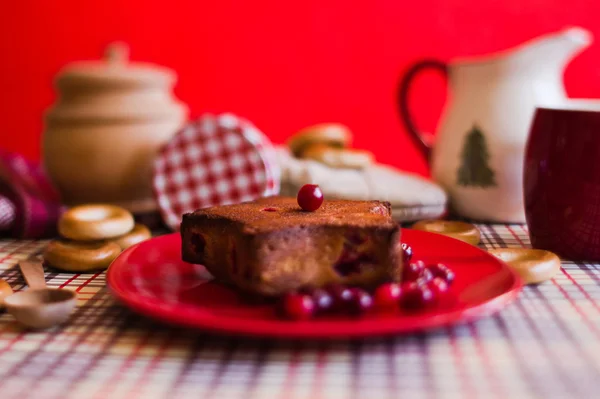 Cranberry cake on the plate in kitchen — Stock Photo, Image