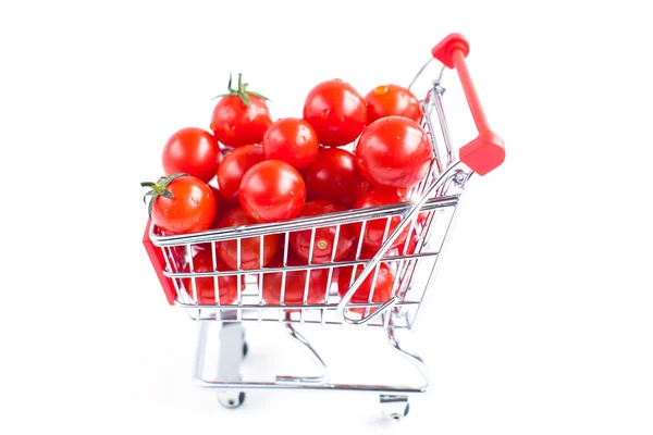 Tomates en el carrito de la compra — Foto de Stock