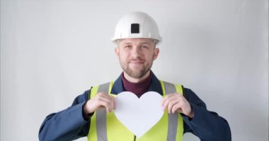 Bearded construction worker Valentines day symbol portrait