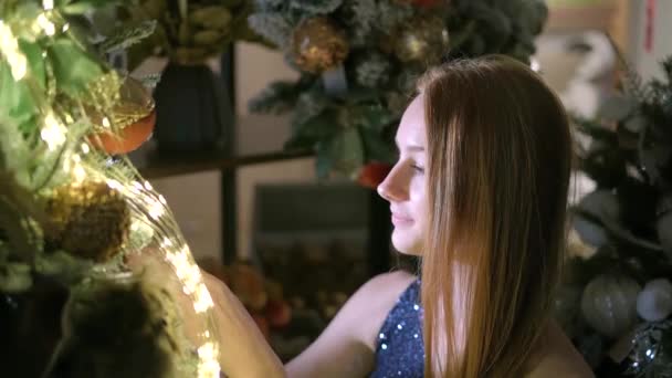 Attractive Teen Kid Girl Decorating Christmas 2022 Tree Led Lights — Video Stock