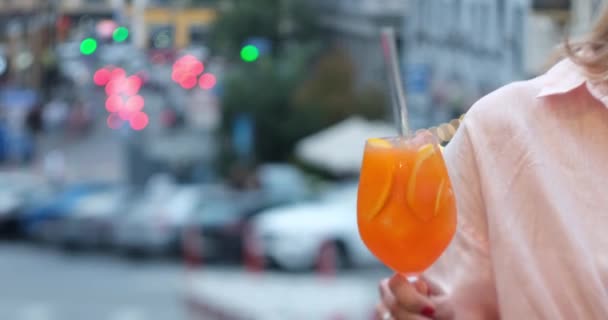 Aperol Spritz Cocktail Close Shot Girl Holds Hand Glass Spritz — Stockvideo