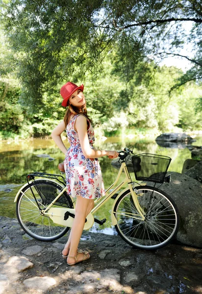 Girl near the river — Stock Photo, Image