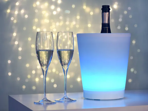 Tho Glasses Champagne Bottle Illuminated Bucket Blurred Lights Background — Stock Photo, Image