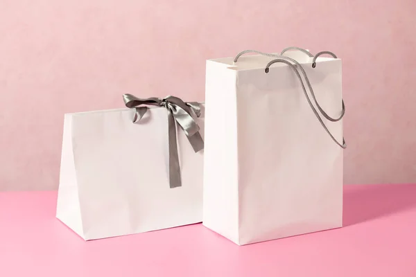 White Shopping Bags Pink Background — Stock fotografie
