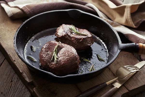 Beef steak in pan — Stock Photo, Image