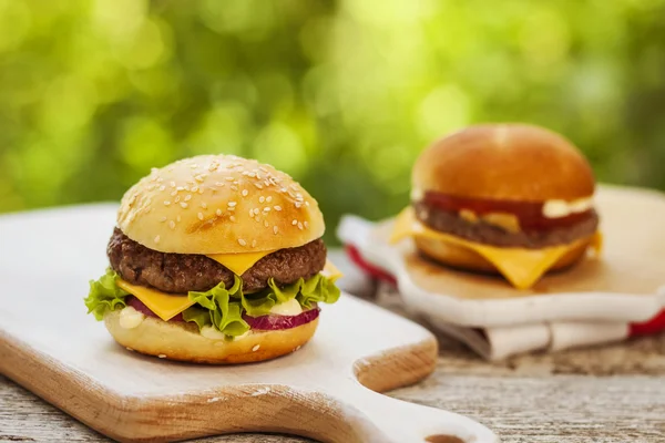 Burgers served outdoor — Stock Photo, Image
