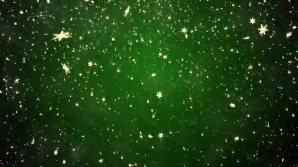 Nevadas sobre un fondo verde — Vídeo de stock