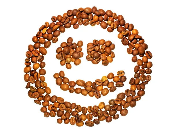 Smile from coffee grains on a white background — Stock Photo, Image