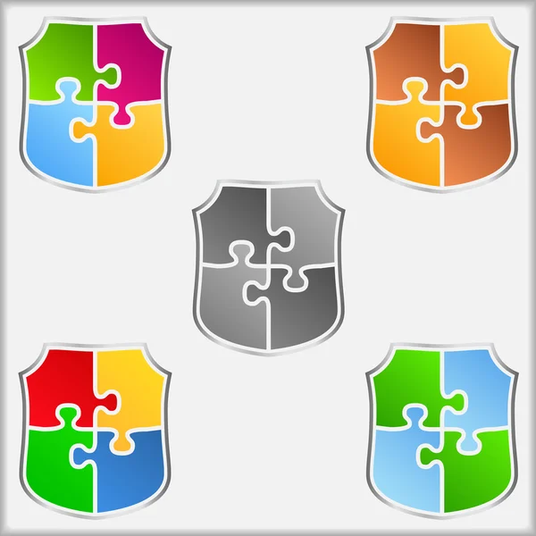 Boucliers de puzzle — Image vectorielle