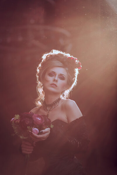 Mysterious woman in black dress